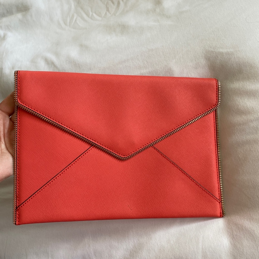 Rebecca Minkoff envelope clutch in Coral